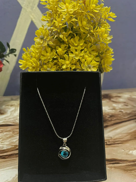 Blue Emerald Love Knot Pendant