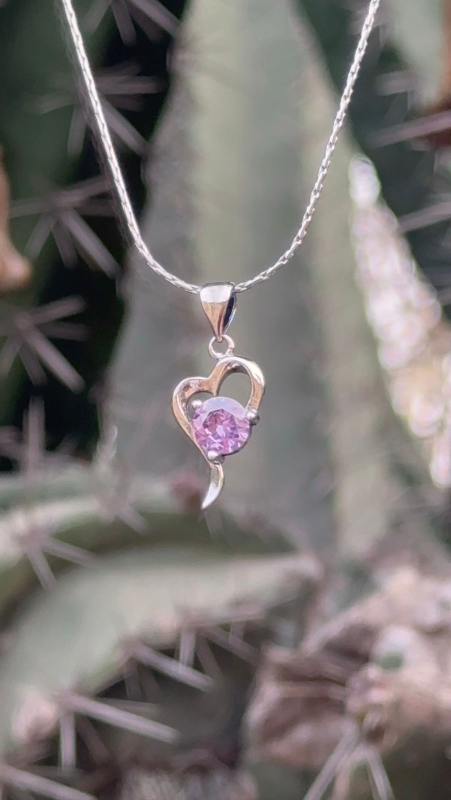 Purple Stone floating in the heart Necklace