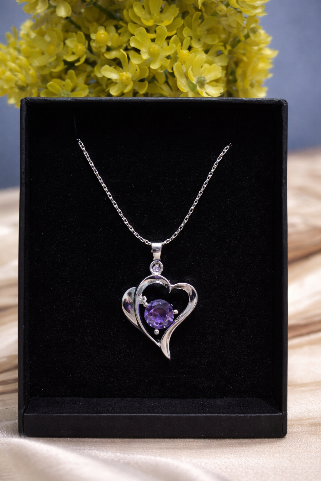 Purple Stone floating in the heart Necklace