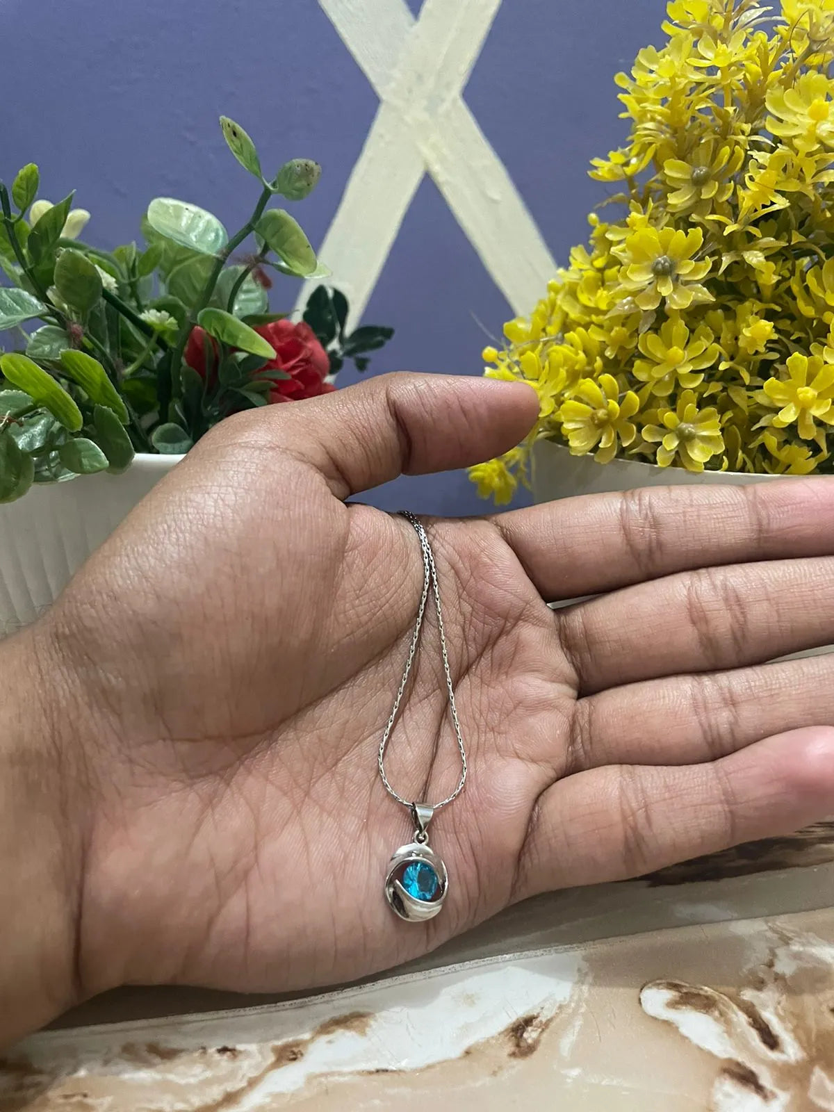 Blue Emerald Love Knot Pendant
